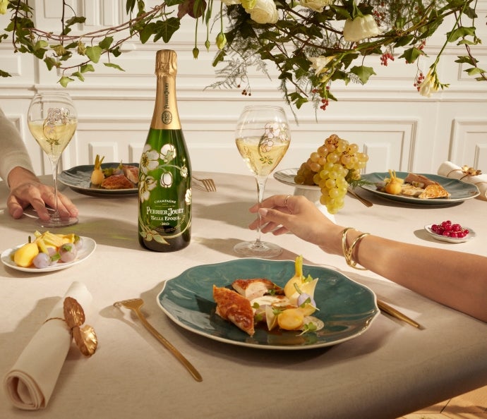 Roast chicken, creamy roasted polenta with Parmesan, raw and cooked turnips plated with a bottle of Perrier-Jouët Belle Époque Brut 2013