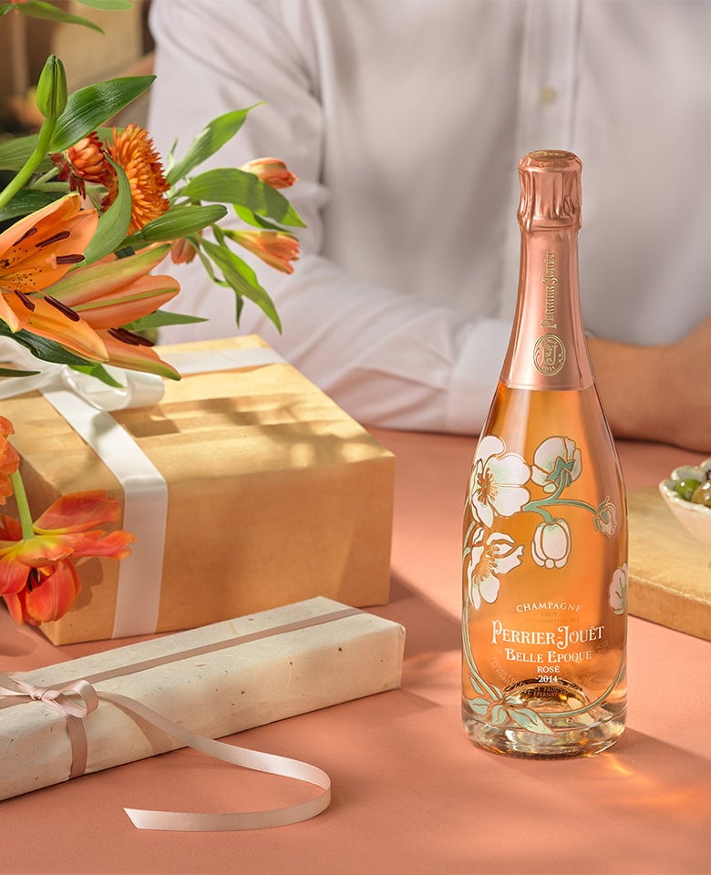 Belle Epoque Rosé 2014 on a table with gifts