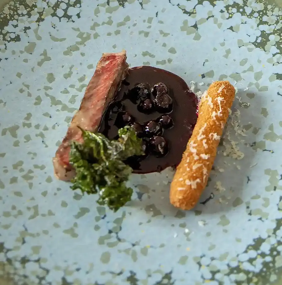 Grilled Wagyu entrecôte with blackcurrant violine sauce
