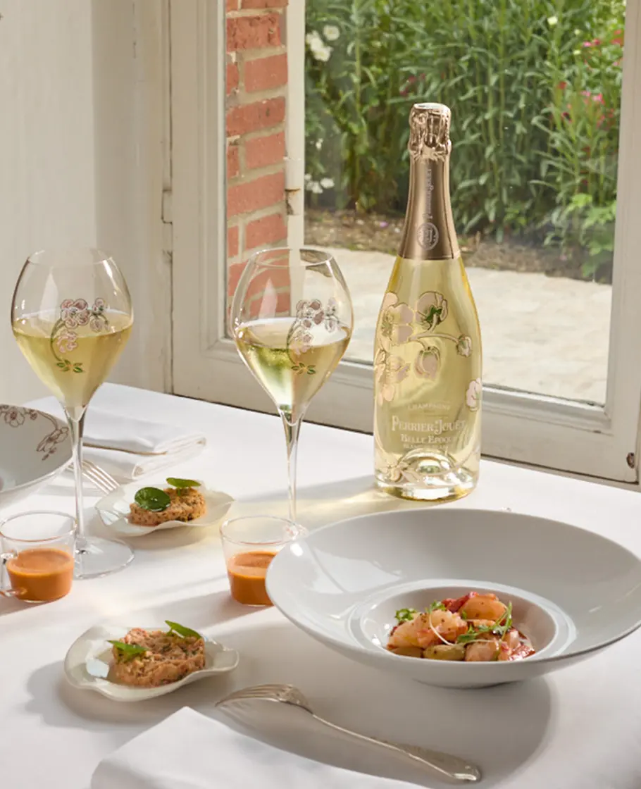 Blue Lobster fricassee cooked with salty butter, cocos de Paimpol and carrot.
