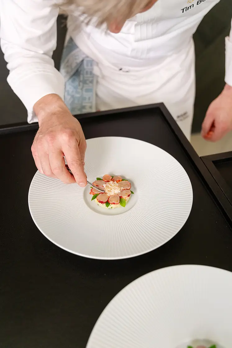 Tim Boury dressing a dish