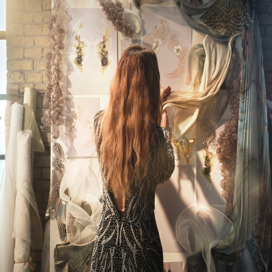 Iris van Herpen in her studio, seen from behind